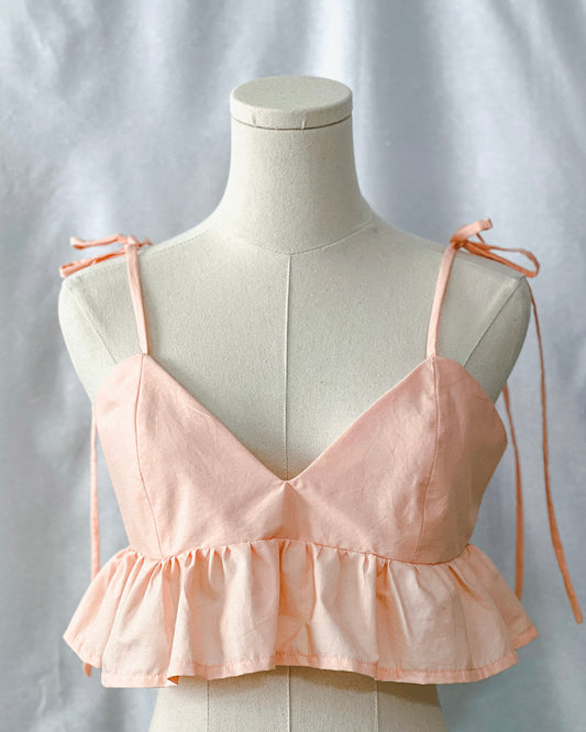 Top cuello en V con volantes